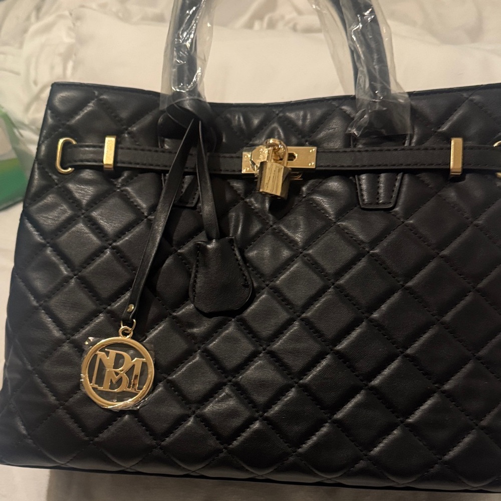 Black Quilted Handbag with Gold Accents